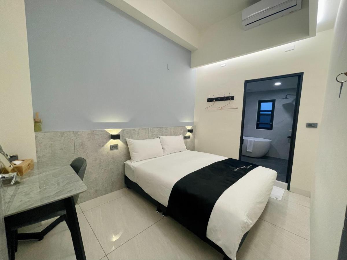 Six Seasons Inn - Qian He تاينان المظهر الخارجي الصورة
